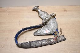 A fine 19th-century Omani white metal khanjar ceremonial dagger, with an animal horn handle,