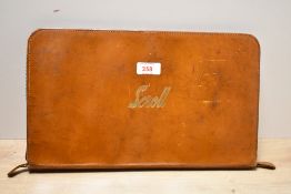A vintage Scroll leather advertising pen organiser, featuring internal leather loops with a
