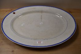 A large 19th-century Wedgwood and Company ironstone oval serving platter, to feature a cream