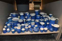 A large quantity of blue and white glazed motto ware, various, to include condiments, egg cups, milk
