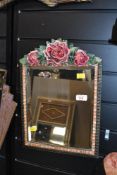A fine early to mid 20th-century Barbola-style rose moulded decorative mirror, adorned with three