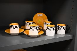A group of 20th-century set of Royal Worcester Art Deco-style 'Bubbles' coffee cans and saucers,