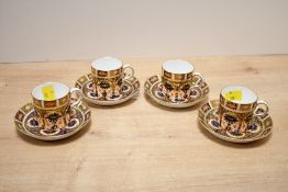 Four 20th-century Royal Crown Derby bone china 'Old Imari, Pattern 1128' coffee cups with saucers,