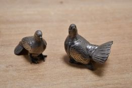 A sweet pair of mid to late 20th-century pewter pigeons, of small proportions, both unmarked, (2),