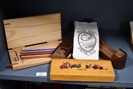 A selection of vintage wooden pencil cases, to feature a sweet rabbit example and a dark wood two-