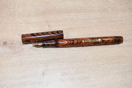 A Waterman 52 Ripple lever fill fountain pen in Red and Black with clipless cap having Waterman 14ct