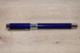 A Waterman Perspective Blue converter fill fountain pen having M steel nib