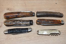 A selection of late 19th to 20th-century pen knives and multi tools, to feature mainly stag