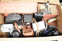 A large selection of vintage film cameras; to feature a Lubitel-2; an Olympus Superzoom 110; a