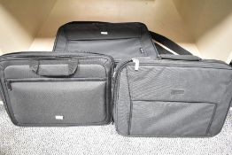 Three padded laptop computer bags.