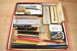 A selection of writing equipment. A Wyvern 82 button fill, a Golden Guinea button fill, Palladium