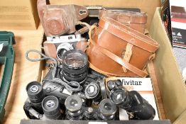 A Pentax MX camera with a Chinon zoom 1:3.5-4.5 f=28-50mm lens, a Halina 35x camera with a Halina