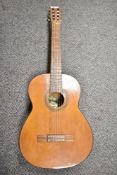 A traditional Spanish classical guitar, labelled internally Angelica model 284 sold by Boosey &