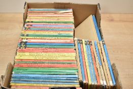 A large collection of vintage Ladybird books in various used condition.