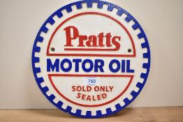 A round Pratts Motor Oil sold only sealed cast wall plaque