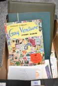 A Gay Venture partially filled stamp album and two further partially filled stamp albums and a small