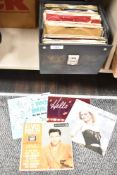 A large collection of single play records contained within two record cases including Elvis