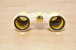 A pair of Soviet USSR Russian Opera/Theatre binoculars, of a bright yellow colour, with original