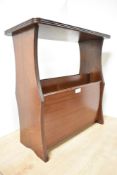 A vintage mahogany magazine rack/table50cm x 47cm x 18cm.