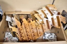 Four thimble wall display shelves in the form of Great Britain sold with approximately forty