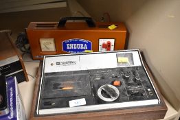A vintage Toshiba Cassette Stereo Deck KT-4030 sold with an Endura Car Battery Charger.