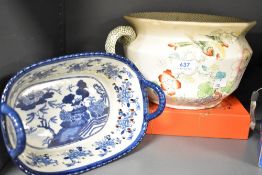 A 19th-century Masons Ironstone chamber pot, featuring colourful floral and foliate decorations with