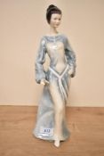 A Royal Doulton bone china figurine 'Boudoir' HN 2542, measuring 31cm tall.