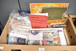 A small collection of vintage destination postcards, The Esso Collection of Football Badges and a