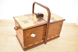 A 20th-century Sorrento ware marquetry sewing box, decorated with a coastal landscape to the two top