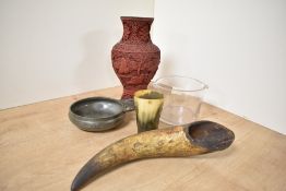 A traditional style Chinese carved red cinnabar lacquer vase, a vintage oriental style pewter