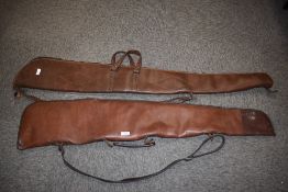 Two fleece lined leather gun slips both zips working
