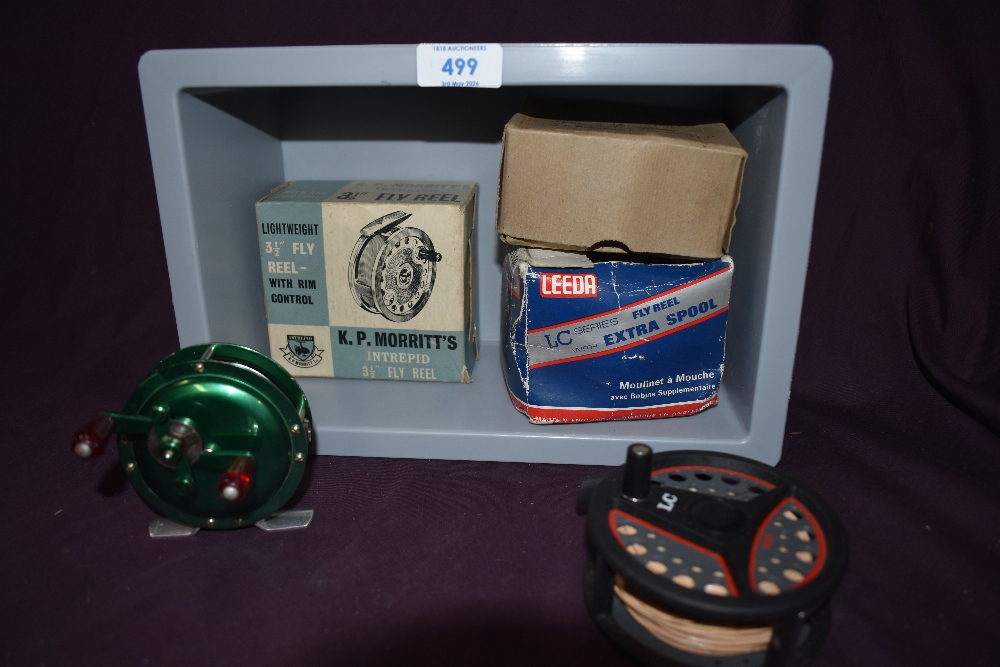 Three fly fishing reels. A Leeda LC 100 composite reel with spare spool works well an unnamed french