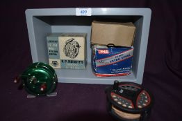 Three fly fishing reels. A Leeda LC 100 composite reel with spare spool works well an unnamed french