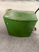 A wooden fishing tackle box with lots of large ledger weights in