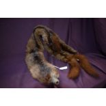 A mink fur stole measuring 90cm long