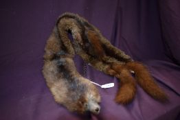 A mink fur stole measuring 90cm long