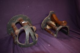 Two Musgraves cast iron tack racks, 19th century wall mounted makers mark to the underside '