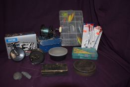 A mixed bag of fishing tackle including an S E Cooke longcast reel, A Ryobi trymaster 70CL a small