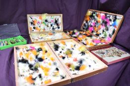 Three large wooden boxes of fishing flies and two boxes of mixed small lures