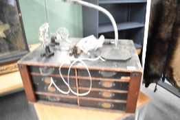 A collectors / specimin chest of 8 draws containing fly tying tools and materials the draws are