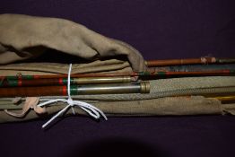 four vintage fishing rods all are unbranded