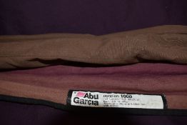 An Abu Garcia Conlon1000 match rod 1130 3pc 13ft 20kg and a 3 pc Sigma graphite 1829-360 3.6meter