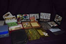 A large selection of fishing flies for both trout and salmon and some empty compartment boxes for