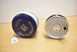 A Hardy marquis #6 3, 1/4 inch trout fly reel in its original blue zippered case very little signs