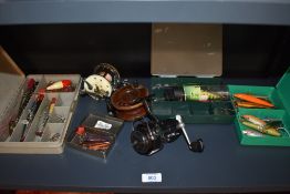 Three vintage fishing reels including a mitchell 602 multiplier and a good selection of lures in