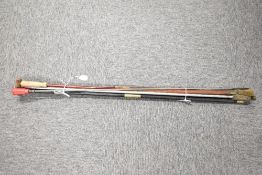 A bundle of rifle and shotgun cleaning rods