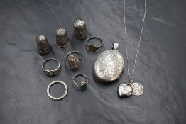 A small assortment of silver and white metal jewellery, including two marcasite set rings, a