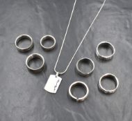Seven gent's silver band rings of various designs, one having a matching pendant, approx 74g total