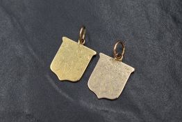 Two Victorian yellow metal Eton College shield medals dated 1883 & 1885. Both presented to S R