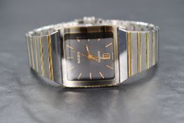 A Rado DiaStar wristwatch, the grey rectangular dial having baton five minute markers and date